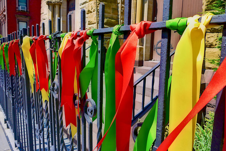 Harlem photo tour ribbons on the railing 4 e mail